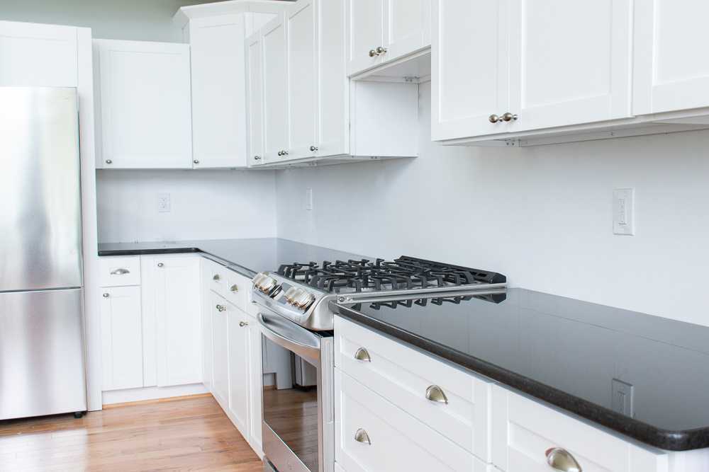 Black Pearl Granite Countertops in White Kitchen