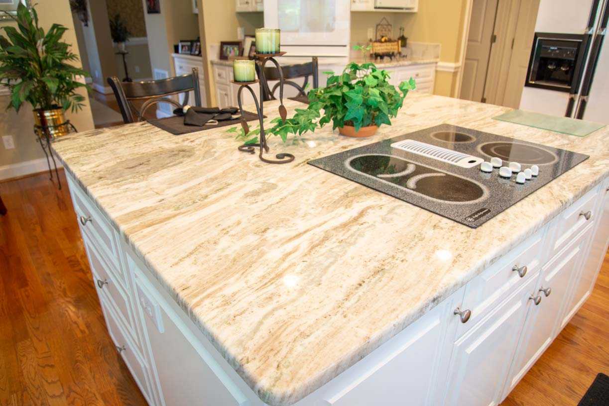 Fantasy Brown Marble Kitchen Countertop Island with White Cabinets