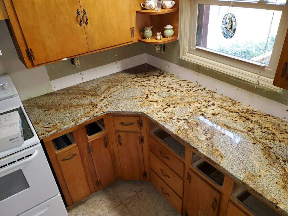 Jaguar Granite Kitchen Countertops with Wood Cabinets