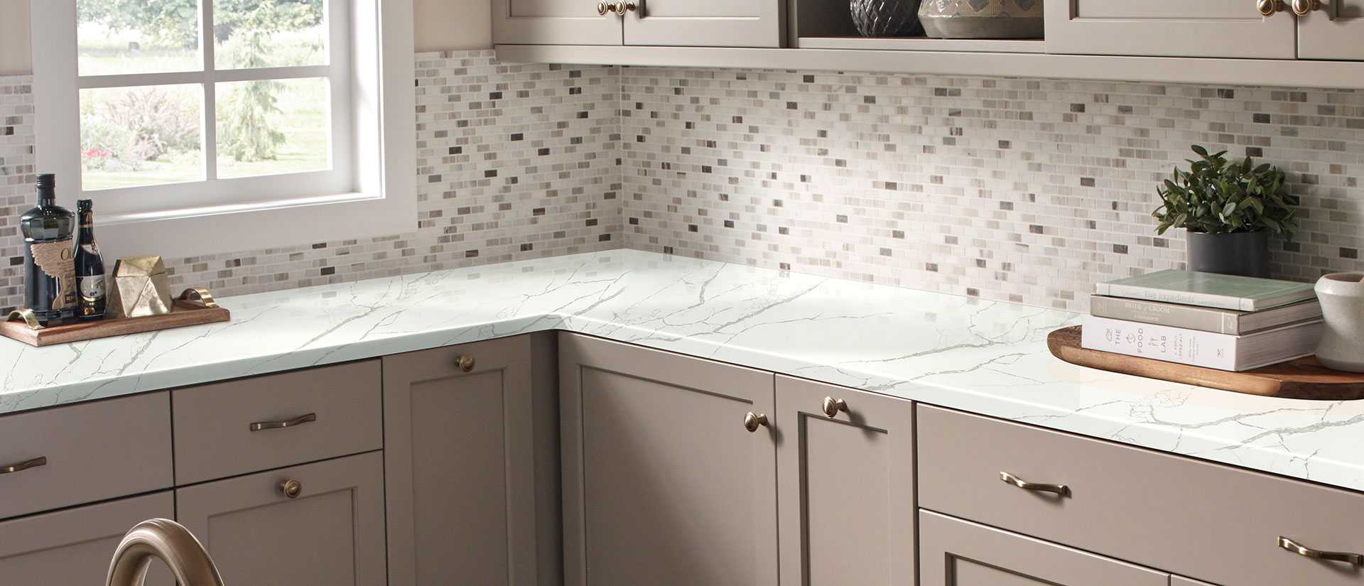 Calacatta Laza Quartz Kitchen Countertop with Shaker Cabinets