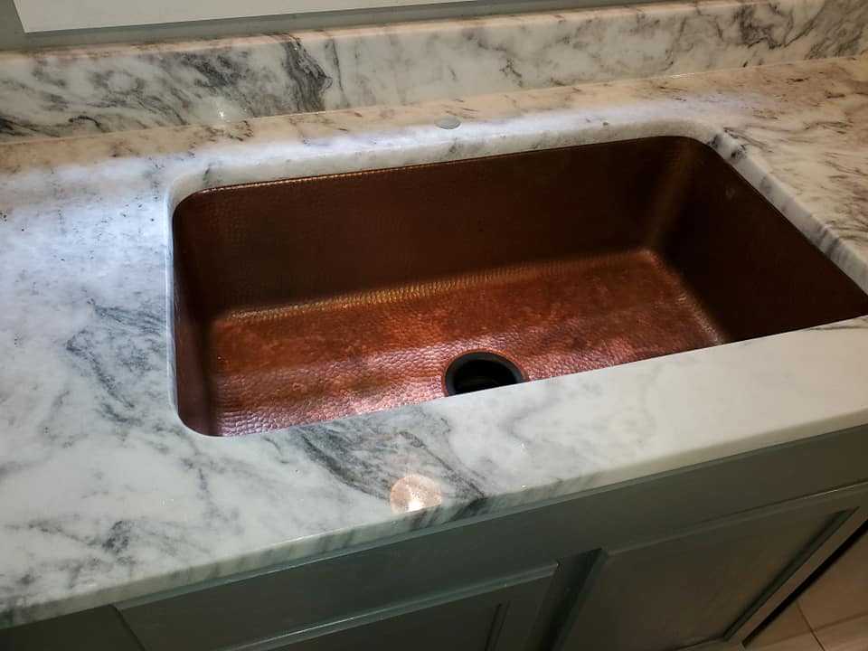 Mont Blanc Marble Countertops with Copper Single Bowl Sink