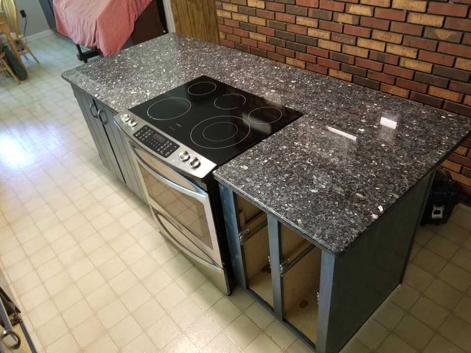 Blue Pearl Granite Kitchen Countertop and Black Cabinets