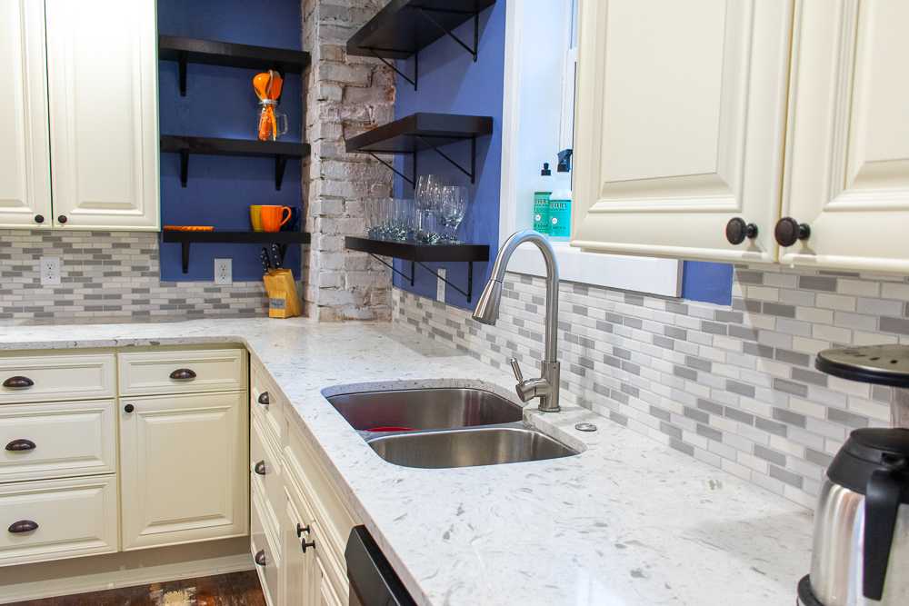 Tropical White Quartz Kitchen Countertops and Stainless Steel Sink