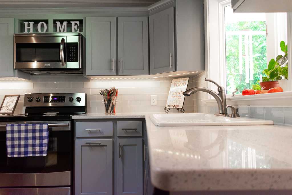 White Lace Quartz Kitchen Countertops with White Subway Tile Backsplash