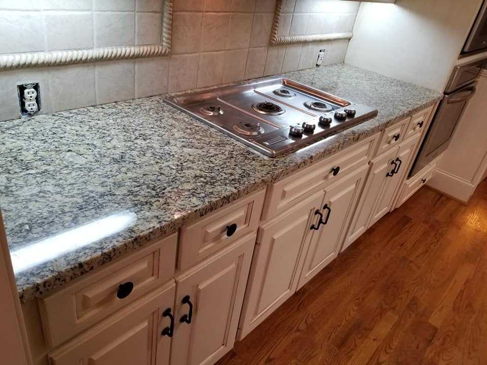 Santa Cecelia Granite Kitchen Countertops Travertine Backsplash Cream Cabinets