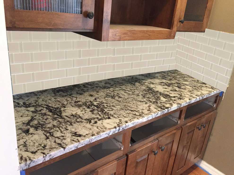 Cold Spring Granite Kitchen Countertop with Natural Wood Cabinets