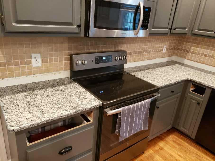 Wave Flower Granite Kitchen Countertops with Custom Shaker Cabinets