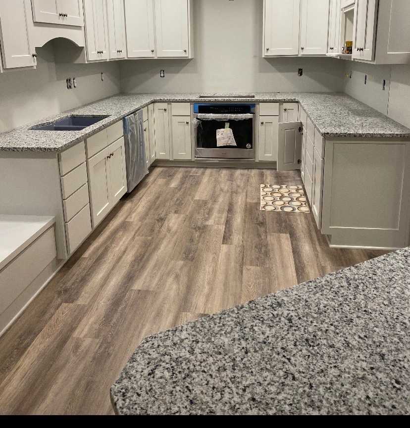 Luna Pearl Granite Kitchen Countertops with Cream Shaker Cabinets