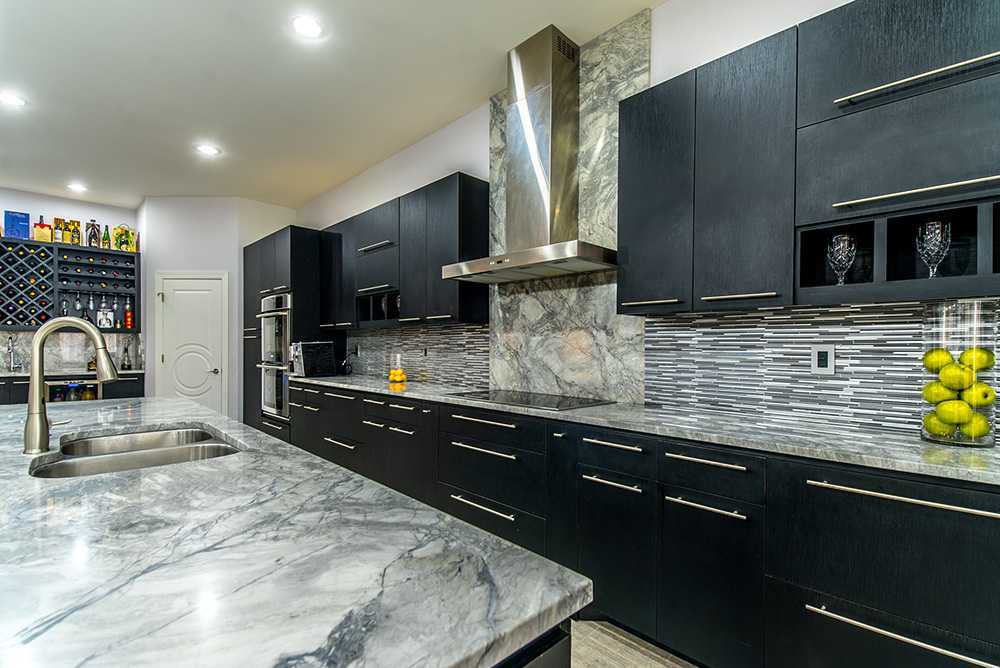 Super White Marble Kitchen Countertop with Black Cabinets